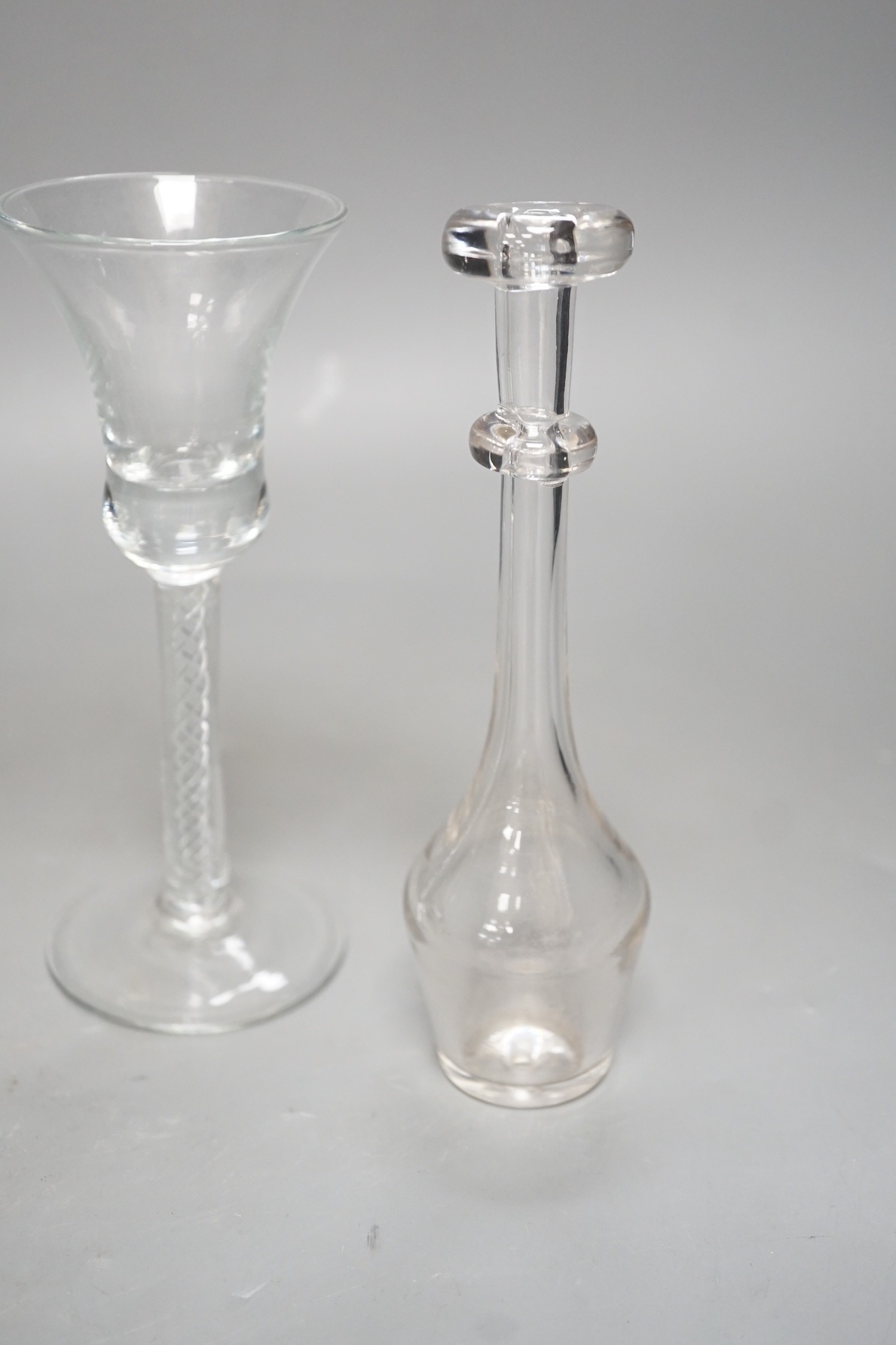 Three opaque or airtwist stem drinking glasses together with a Toddy lifter - 18cm high
